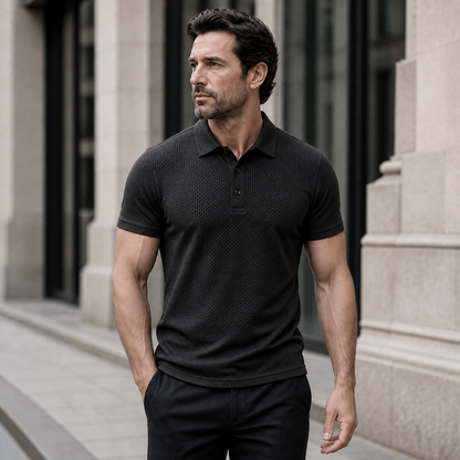 Man wearing the Omni textured polo shirt in an urban setting